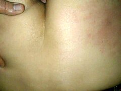 She moans as he enters her tight ass, finding the anal pleasure deliciously intense.