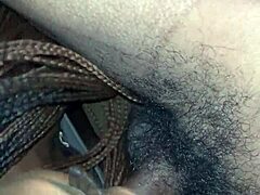 ebony performer in oral scene with facial