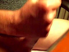 Mature lady masturbates and receives a huge cumshot all over