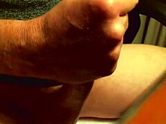 Mature lady masturbates and receives a huge cumshot all over