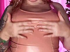 teasing in a latex dress with curvy milf features