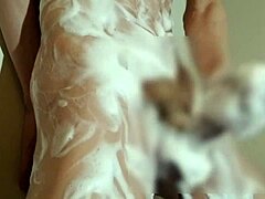 Young Japanese Boy Enjoys Bubbly Bath Time with Full Relaxation