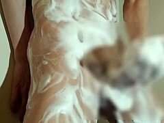 Young Japanese Boy Enjoys Bubbly Bath Time with Full Relaxation