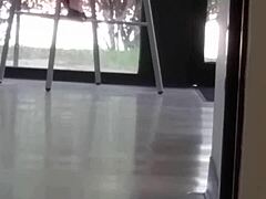 mature woman engages in shoe play with feet and shoes