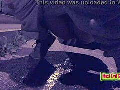 Girl caught on sex tape pissing in public parking lot at night. Pants down in the open for all to see.
