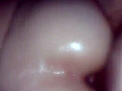 Oiled pussy fucked by cock in detailed scene