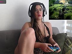 sexy latina playing video game while fingering herself