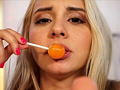 Sussy Love enjoys playing with her lollipop