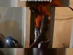 Sexy male stripper performs at a lively party event.