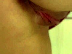 Curly blonde dances funk in kitchen pajamas