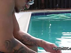 Interracial titty fucking with sexy MILF in the pool at night