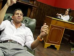 Sexy brunette doctor gives patient a blowjob in the office