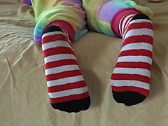 Asian cosplayer strips socks in a voyeur fetish session with ripped clothes