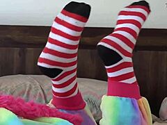 Asian cosplayer strips socks in a voyeur fetish session with ripped clothes