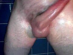 solo guy masturbates with oiled handjob in private session