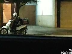 Handjob given on public road outdoors