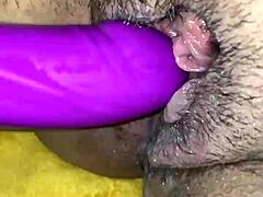 The hot milf pleasures herself intensely, fucking her pussy with passion.