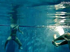 Teen brunette poses erotically in pool, contrasting underwater and above, russian babe bathing