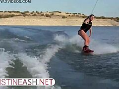German mature milf Christineash shows off her sexy big breasts while waterskiing