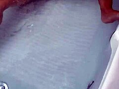 The sexy pornstar masturbates in the hydro massage bathtub, moaning as she touches her boobs and cock!