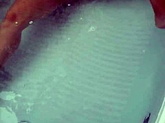 The sexy pornstar masturbates in the hydro massage bathtub, moaning as she touches her boobs and cock!