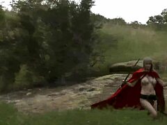 Cosplay babe masturbating with dildo on grass outdoors