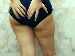 beautiful indian girl in black bra talks dirty at home.