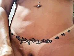 Milf plays with dildo in naked pussy.