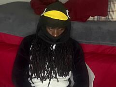 Guccicapone in onesie gives handjob to big black cock, leading to explosive cumshot in homemade scene