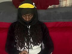 Guccicapone in onesie gives handjob to big black cock, leading to explosive cumshot in homemade scene