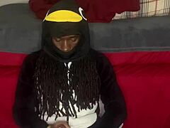Guccicapone in onesie gives handjob to big black cock, leading to explosive cumshot in homemade scene