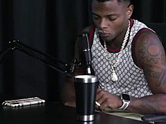 Will mastro strips in sheer red lingerie for glamour shoot