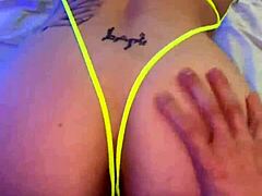 Tattooed beauty Misha Montana in seductive home video showcasing her piercing and spanking skills