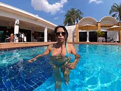 Black pornstar Natzinha gives anal to Mr. Matusalem by the pool