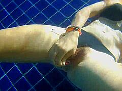 Public pool threesome with panty stuffing and black dildo action