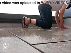 Feels so good masturbating wet in the rain on the balcony.