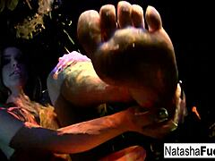 Busty Natasha Nice shoots fun black light video