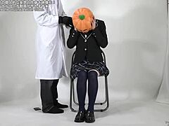 Masked Person Struggles To Remove Fetish Mask