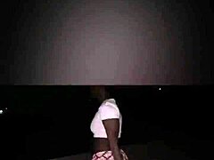 Beautiful black woman stripping and exposing her body and ass.