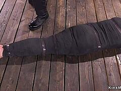 man, this mummified brunette is getting whipped hard in kinky bondage play