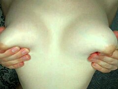 girlfriend drooling over big tits during nipple play at home