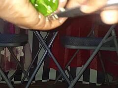 Mature woman masturbates with plantain and pepper to orgasm