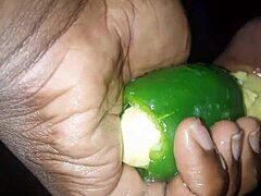 Mature woman masturbates with plantain and pepper to orgasm