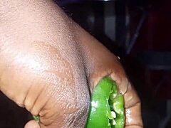 Mature woman masturbates with plantain and pepper to orgasm