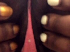 Ebony Babe Teases Striptease In Public Bathroom