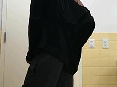 Ebony Babe Teases Striptease In Public Bathroom