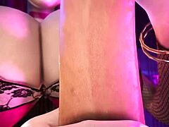 Beautiful bra and tits with a vampire themed handjob