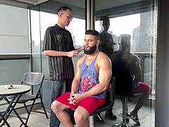 Gay barber serves his customer in a rather unusual manner