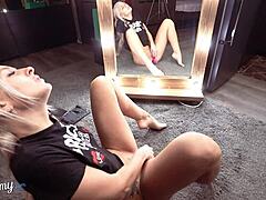 Sexy Blonde Enjoys Solo Time at Mirror