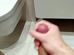 solo guy jerks and spills in bathroom session
